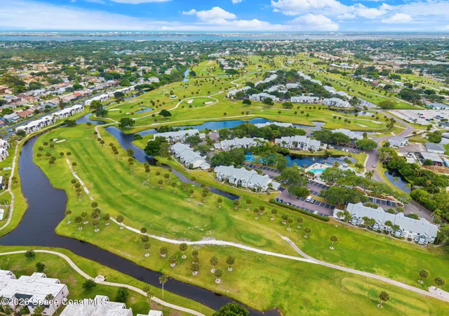 Listing Photo 2 - Condo for sale in building located at 2727 N Wickham Rd, Melbourne, FL 32935 - Unit #103-5