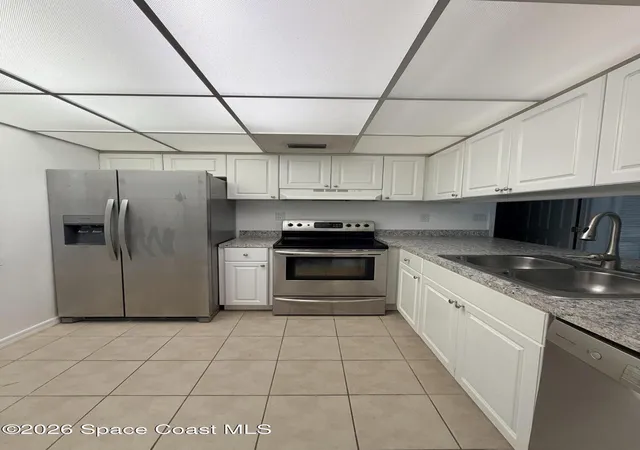 Photo 4 of Condo for sale at 2727 N Wickham Rd #103-5, Melbourne, FL 32935 | MLS# 1086795 | Listing updated on 2026-09-05