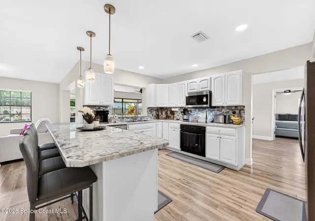Photo 2 of Single family home for sale at 405 Tortoise View Cir, Satellite Beach, FL 32937 | MLS# 1087150 | Listing updated on 2026-09-11