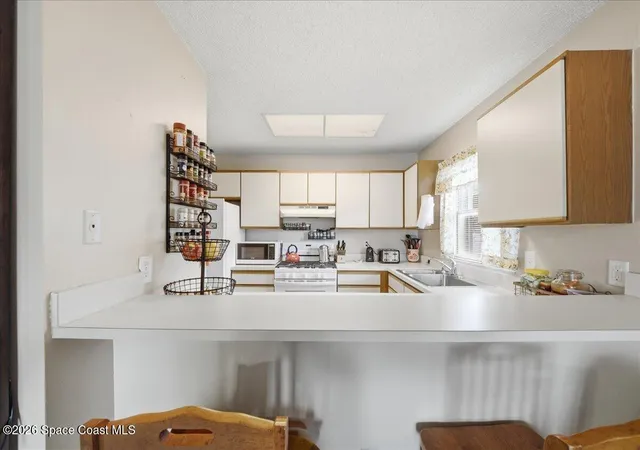 Listing Photo 5 - Condo for sale in building located at 131 Mcneela Dr, Titusville, FL 32796 - Unit #131