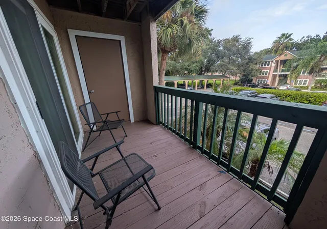 Listing Photo 2 - Condo for sale in building located at 7667 N Wickham Rd, Melbourne, FL 32940 - Unit #711