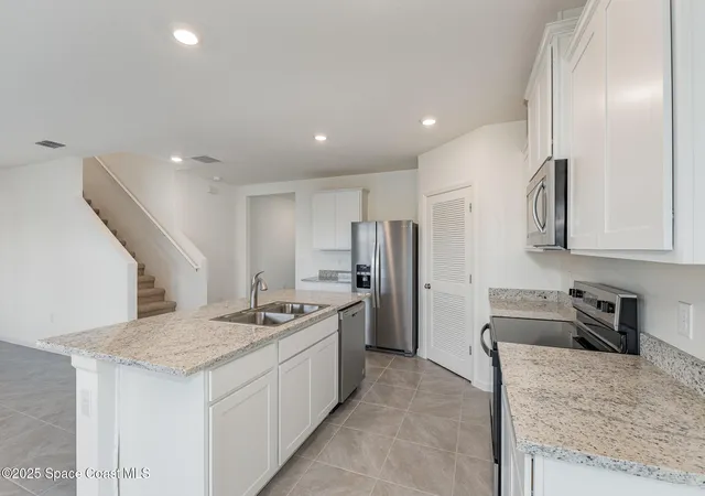 Photo 3 of Single family home for sale at 1644 Garabaldi Cir SE, Palm Bay, FL 32909 | MLS# 1087013 | Listing updated on 2026-09-09