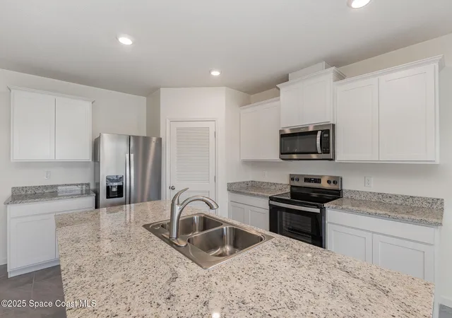 Photo 4 of Single family home for sale at 1644 Garabaldi Cir SE, Palm Bay, FL 32909 | MLS# 1087013 | Listing updated on 2026-09-09