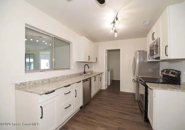 Photo 3 of Single family home for sale at 653 Atlas Ave Ne, Palm Bay, FL 32905 | MLS# 1087164 | Listing updated on 2026-09-14