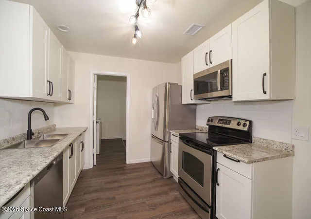 Photo 3 of Single family home for sale at 653 Atlas Ave NE, Palm Bay, FL 32905 | MLS# 1087164 | Listing updated on 2026-09-14