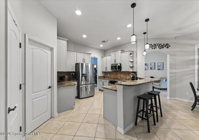 Photo 2 of Single family home for sale at 1848 Windbrook Dr SE, Palm Bay, FL 32909 | MLS# 1087183 | Listing updated on 2026-09-28