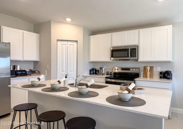 Photo 1 of Single family home for sale at 765 San Filippo Dr SE, Palm Bay, FL 32909 | MLS# 1087734 | Listing updated on 2026-10-27