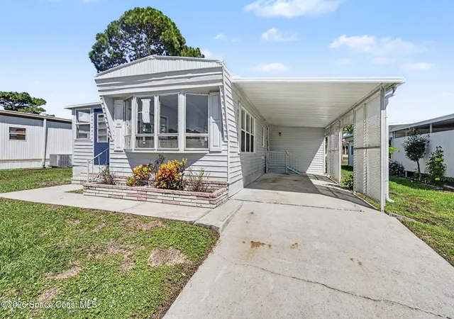 Photo 3 of Manufactured home for sale at 1171 Seminole Ct Ne, Palm Bay, FL 32907 | MLS# 1088120 | Listing updated on 2026-09-24