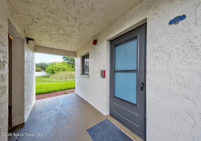 Listing Photo 1 - Condo for sale in building located at 2775 N Wickham Rd, Melbourne, FL 32935 - Unit #A-101