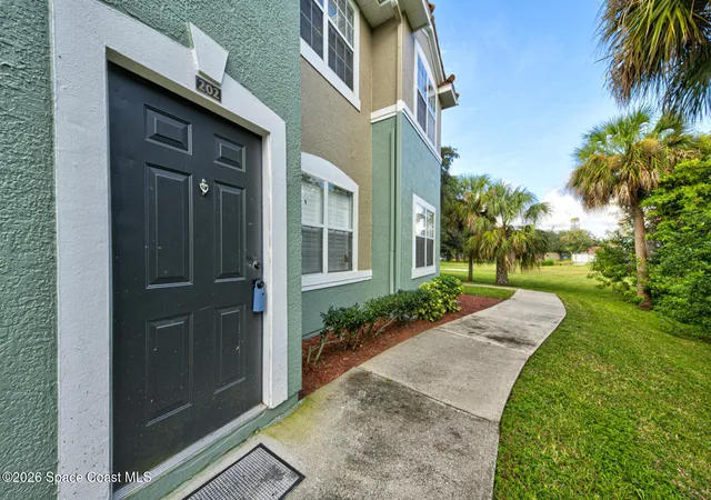 Listing Photo 2 - Condo for sale in building located at 5663 Star Rush Dr, Melbourne, FL 32940 - Unit #202