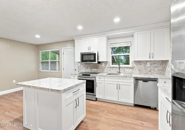 Photo 2 of Single family home for sale at 11948 Aaron Rd, Jacksonville, FL 32218 | MLS# 2118953 | Listing updated on 2026-09-10