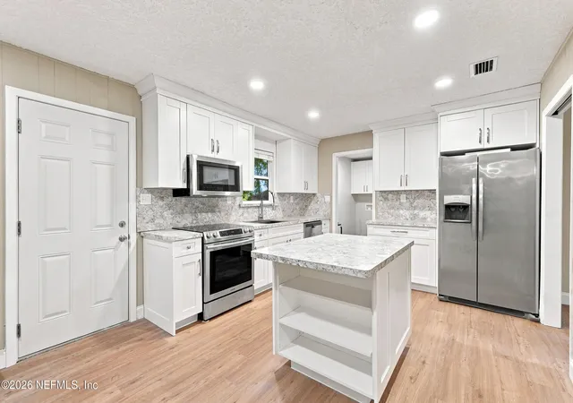 Photo 3 of Single family home for sale at 11948 Aaron Rd, Jacksonville, FL 32218 | MLS# 2118953 | Listing updated on 2026-09-10