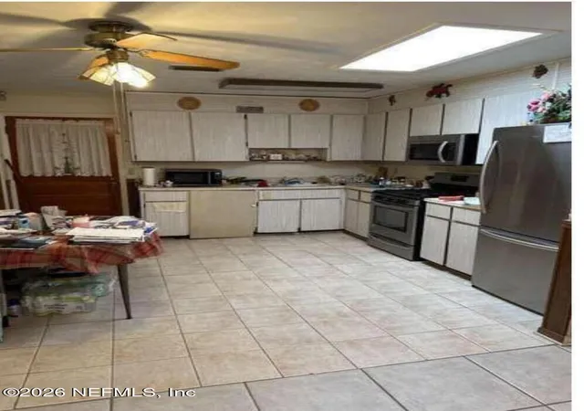 Photo 3 of Single family home for sale at 10411 Tulsa Rd, Jacksonville, FL 32218 | MLS# 2144699 | Listing updated on 2026-10-06