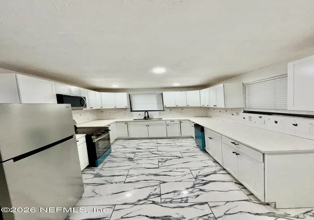 Photo 4 of Single family home for sale at 1929 W 10th Street, Jacksonville, FL 32209 | MLS# 2156447 | Listing updated on 2026-09-09