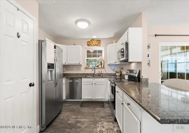 Photo 4 of Single family home for sale at 7862 Praver Dr W, Jacksonville, FL 32217 | MLS# 2163474 | Listing updated on 2026-09-14
