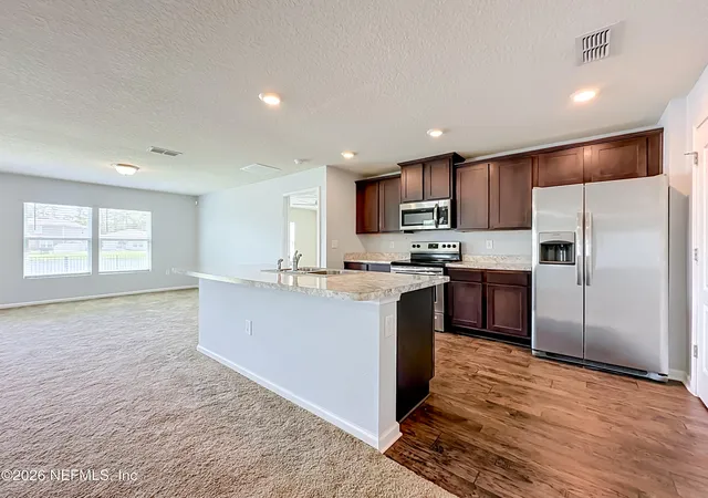 Photo 3 of Single family home for sale at 2408 Sea Palm Ave, Jacksonville, FL 32218 | MLS# 2163391 | Listing updated on 2026-09-07