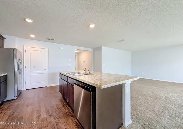 Photo 4 of Single family home for sale at 2408 Sea Palm Ave, Jacksonville, FL 32218 | MLS# 2163391 | Listing updated on 2026-09-07