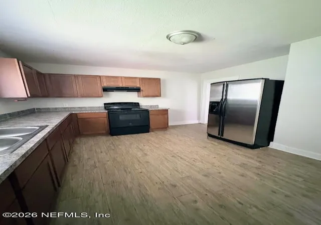 Photo 3 of Single family home for sale at 5779 Sw Carver Cir, Jacksonville, FL 32208 | MLS# 2163907 | Listing updated on 2026-09-09