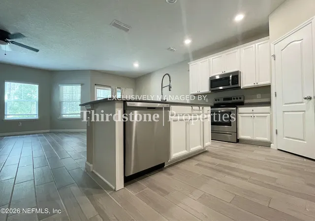 Photo 3 of Townhouse for sale at 10312 Benson Lake Dr, Jacksonville, FL 32222 | MLS# 2164026 | Listing updated on 2026-09-15
