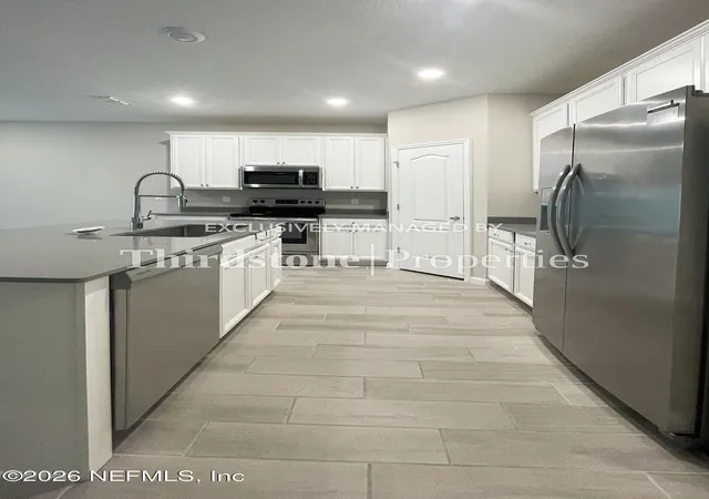 Photo 4 of Townhouse for sale at 10312 Benson Lake Dr, Jacksonville, FL 32222 | MLS# 2164026 | Listing updated on 2026-09-15