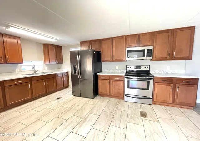 Photo 3 of Manufactured home for sale at 7623 Sunwood Dr, Jacksonville, FL 32256 | MLS# 2164505 | Listing updated on 2026-09-12
