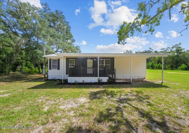 Photo 1 of Manufactured home for sale at 214 Phoenix St, Satsuma, FL 32189 | MLS# 2165246 | Listing updated on 2026-10-05