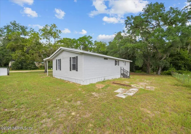 Photo 4 of Manufactured home for sale at 214 Phoenix St, Satsuma, FL 32189 | MLS# 2165246 | Listing updated on 2026-10-05