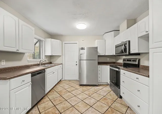 Photo 4 of Single family home for sale at 8232 Frost St N, Jacksonville, FL 32221 | MLS# 2166066 | Listing updated on 2026-09-23