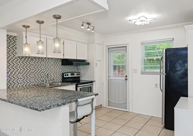Listing Photo 5 - Condo for sale in building located at 1800 S Palmetto Ave, Daytona Beach, FL 32119 - Unit #1090