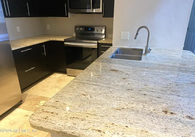 Photo 2 of Condo for sale at 8550 Touchton Rd #1227, Jacksonville, FL 32216 | MLS# 2165721 | Listing updated on 2026-09-21