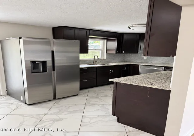 Photo 2 of Single family home for sale at 416 Janell Dr, Orange Park, FL 32073 | MLS# 2165591 | Listing updated on 2026-10-04