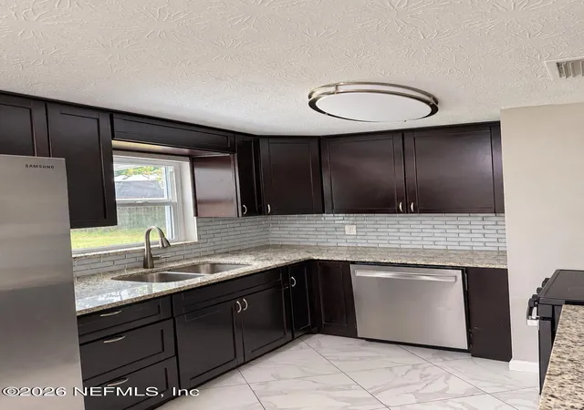 Photo 3 of Single family home for sale at 416 Janell Dr, Orange Park, FL 32073 | MLS# 2165591 | Listing updated on 2026-10-04