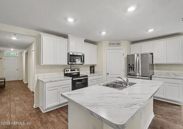 Photo 3 of Single family home for sale at 100 Ryan Dr, Palm Coast, FL 32164 | MLS# 2166130 | Listing updated on 2026-10-27