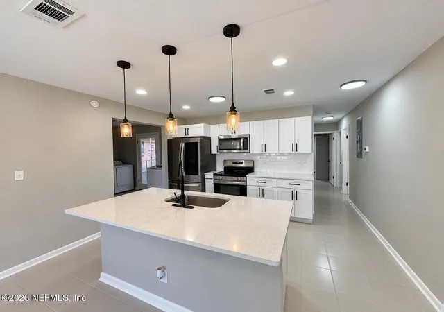 Photo 3 of Single family home for sale at 4942 Spring Glen Rd, Jacksonville, FL 32207 | MLS# 2165816 | Listing updated on 2026-09-21