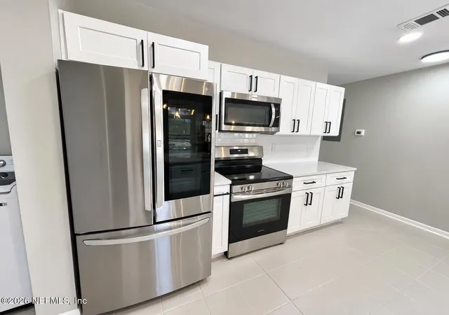 Photo 3 of Single family home for sale at 4942 Spring Glen Rd, Jacksonville, FL 32207 | MLS# 2165816 | Listing updated on 2026-09-21