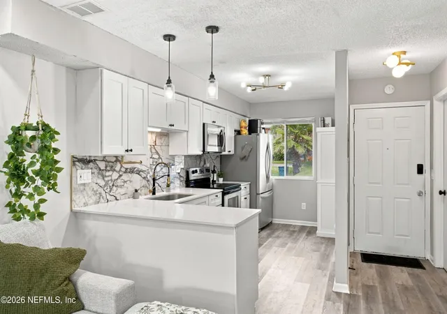 Photo 3 of Townhouse for sale at 11632 Dunes Way Dr N, Jacksonville, FL 32225 | MLS# 2166166 | Listing updated on 2026-09-28