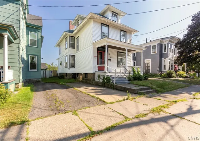 Photo 2 of Single family home for sale at 80 E Utica St, Oswego, NY 13126 | MLS# S1666412 | Listing updated on 2026-09-10