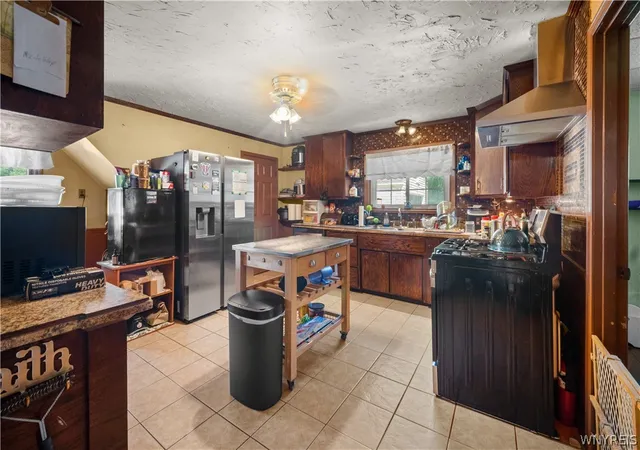 Photo 3 of Single family home for sale at 102 Dorrance Ave, Buffalo, NY 14218 | MLS# B1693666 | Listing updated on 2026-09-09