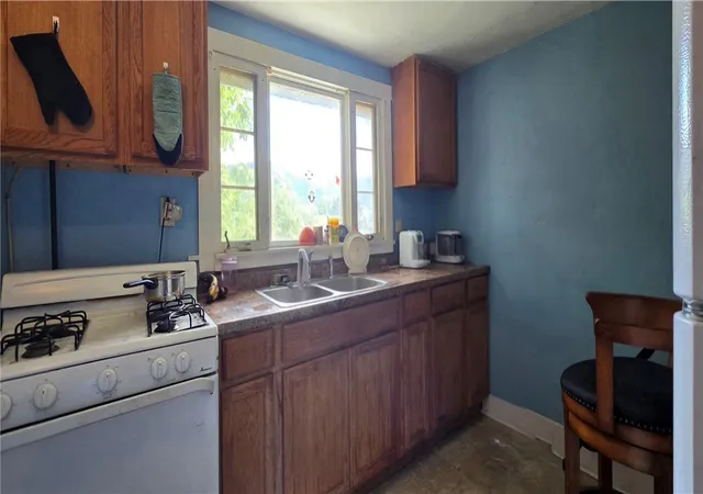 Photo 2 of Multi family home for sale at 1736 Grand Central Ave, Elmira, NY 14903 | MLS# R1699014 | Listing updated on 2026-09-15