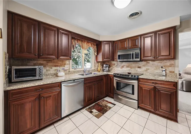 Photo 3 of Sale Pending at 72 Ann Marie Dr, Rochester, NY 14606 | MLS# R1703723 | Listing updated on 2026-08-15
