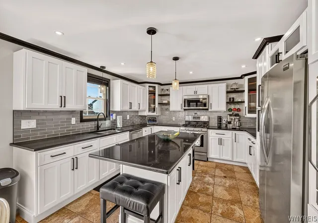 Photo 2 of Sale Pending at 7034 Walmore Rd, Niagara Falls, NY 14304 | MLS# B1704811 | Listing updated on 2026-08-12
