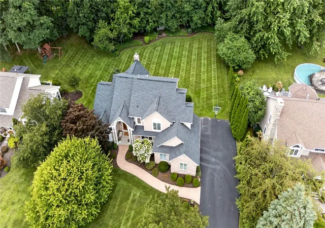 Photo 2 of Sale Pending at 8 Folkestone Ln, Penfield, NY 14526 | MLS# R1702886 | Listing updated on 2026-09-03