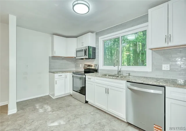 Photo 3 of Sale Pending at 205 Van Voorhis Ave, Rochester, NY 14617 | MLS# B1711124 | Listing updated on 2026-09-01