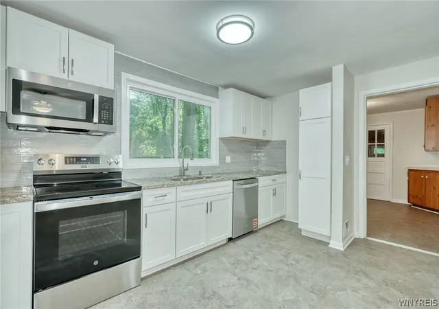 Photo 4 of Sale Pending at 205 Van Voorhis Ave, Rochester, NY 14617 | MLS# B1711124 | Listing updated on 2026-09-01