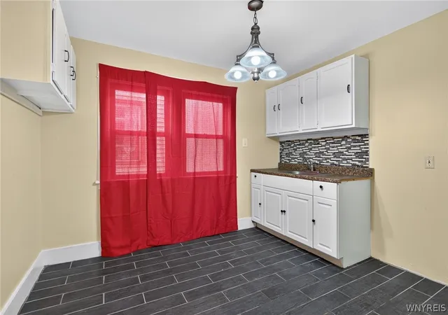 Photo 4 of Single family home for sale at 455 Lisbon Ave, Buffalo, NY 14215 | MLS# B1710992 | Listing updated on 2026-09-13