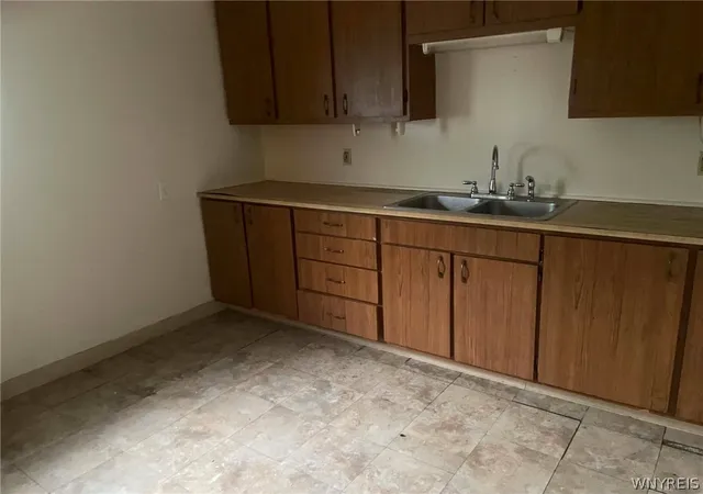 Photo 4 of Multi family home for sale at 1021 Michigan Ave, Niagara Falls, NY 14305 | MLS# B1711218 | Listing updated on 2026-09-04