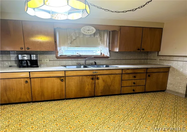 Photo 4 of Single family home for sale at 1233 George Urban Blvd, Buffalo, NY 14225 | MLS# B1711211 | Listing updated on 2026-09-02