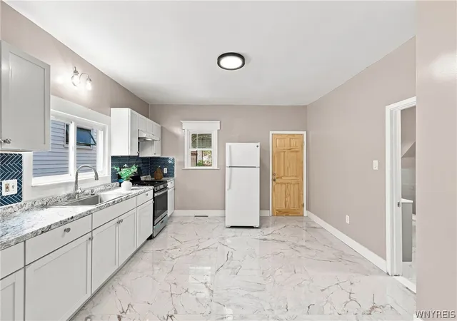 Photo 4 of Multi family home for sale at 130 Ridge Park Ave, Buffalo, NY 14211 | MLS# B1710672 | Listing updated on 2026-09-11