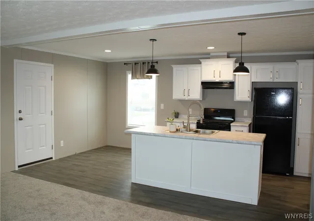Photo 3 of Manufactured home for sale at 1774 Military Rd, Buffalo, NY 14217 | MLS# B1711320 | Listing updated on 2026-09-04