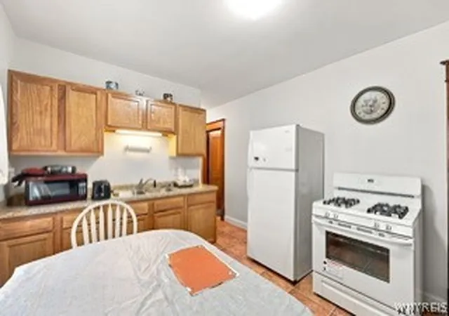 Photo 4 of Multi family home for sale at 218 Cambridge Ave, Buffalo, NY 14215 | MLS# B1712643 | Listing updated on 2026-09-10